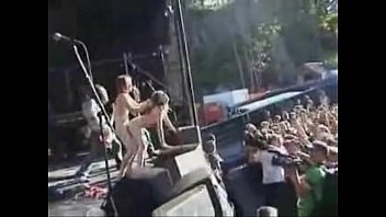 Couple fuck on stage during a concert