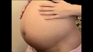 senhora grávida se sentindo sexy - PregnantHorny.com