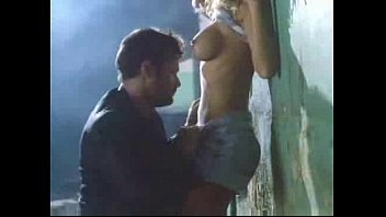 Pamela Anderson against wall sex scene