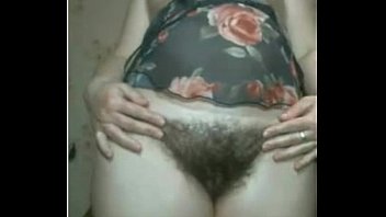 Plays With Her Hairy Pussy
