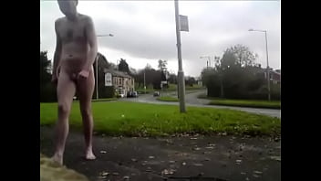 Waiting naked at a bus stop on busy road - public nudity
