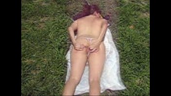 Exhibitionist-slut-wife-almost-naked-in-public-park-to-tan-3