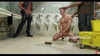 Boy in rest room enjoys sucking cocks
