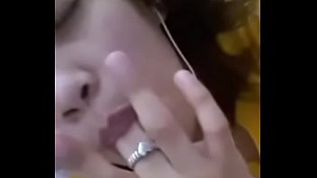 Asian amateur licking her own cum off her fingers