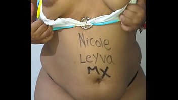 Chubby Mexican posing for some photos and her boyfriend masturbates and comes on her feet, shows tits for the photos and in the video
