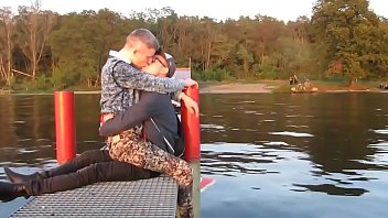 two hot gays kisses each other with passion outdoor