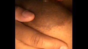 Sucking on my juicy nipple wishing it was a dick
