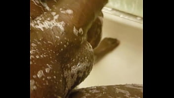 Stroking black dick in shower
