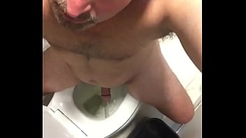 Sexy American Ken, take a pee and let us watch, beautiful body, cock, ass and eye contact! Exposed Faggot