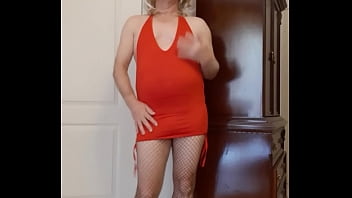 Sissy crossdresser wearing very short red mini dress