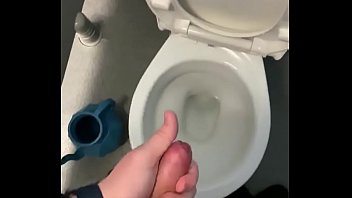 Wanking in public toilets with big cumshot at the end