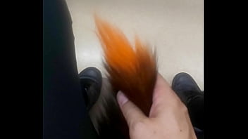 I'm sticking an anal plug made of a fox tail.