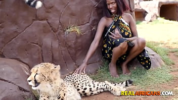 WTF! IS SHE SUCKING BBC IN FRONT OF A LION??