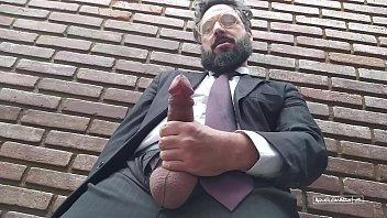 Pervert executive masturbates himself in the office garden
