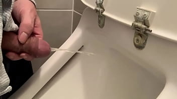 Me pissing in a urinal