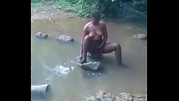 hot african woman taking bath