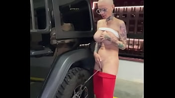 crazy bald girl masturbation in the parking lot and squirting on wheel jeep, tattooed slut