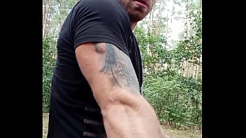 Smoking cigarette in the forest also jerking off with cumshot and bodybuilding pose