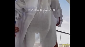 Vanessa showing off on the balcony without clothes