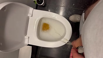 Pissing on a public toilet