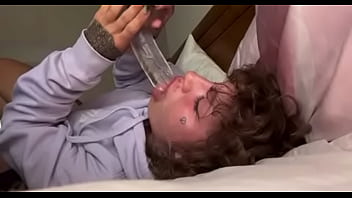 Upside down dildo sucking on the bed