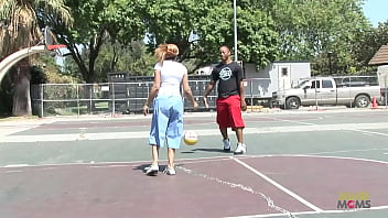 Competitive ebony babe loses a basketball bet so she has to suck a big cock
