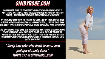 Sindy Rose take wine bottle in ass & anal prolapse at sandy dunes