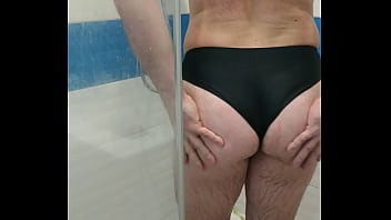 Sexy tranny wearing one piece swimsuit and jerking