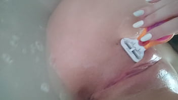 I shaved my pussy and in turn inserted two smaller and larger rubber penises