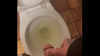 Pissing in public bathroom