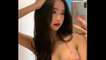Cute asian girl showing off
