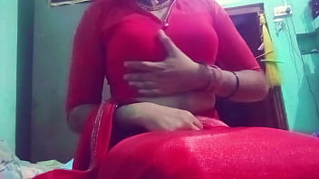 Indian Gay Crossdresser in red saree xxx feeling the feminine feel and playing with her boobs