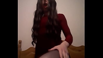 Femboy showing ass in dress and sucking on a didlo